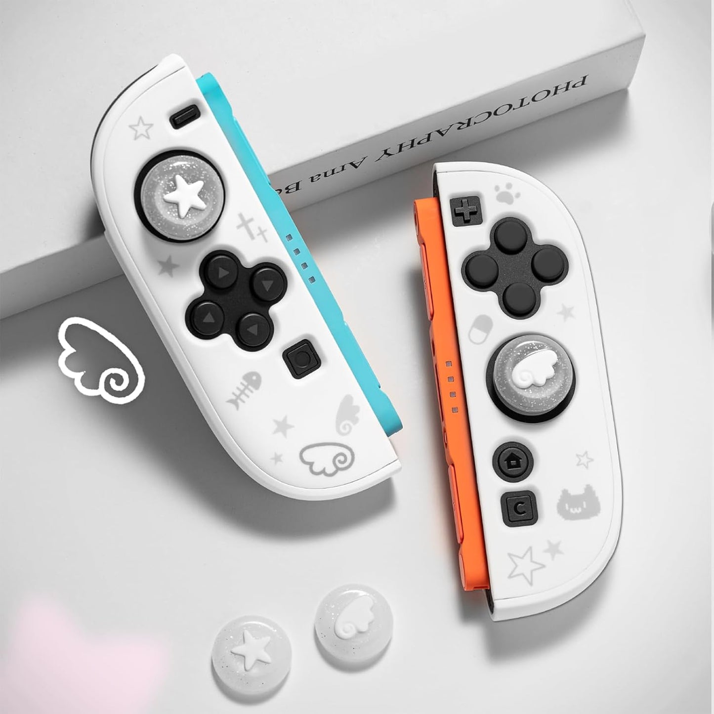 Hvide vinger - 4 pak Thumb Grips til Nintendo Switch 2