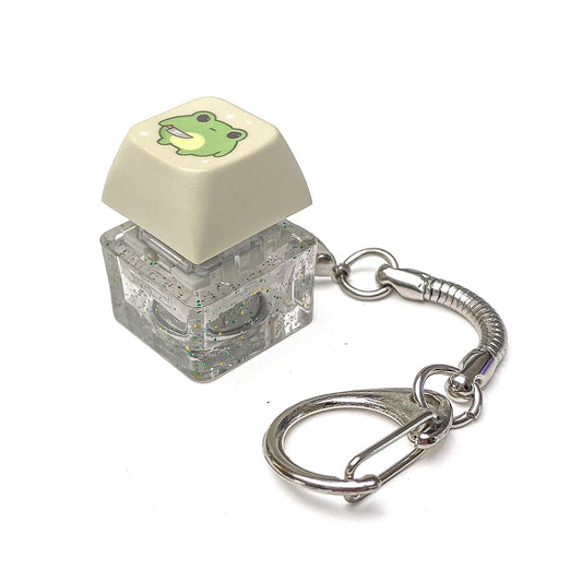 Lysegrå keycap clicker fidget nøglering med lys