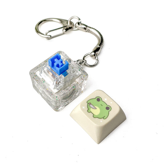 Lysegrå keycap clicker fidget nøglering med lys