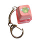 Lyserød keycap clicker fidget nøglering med lys