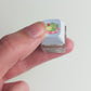 Light blue keycap clicker fidget keychain with light