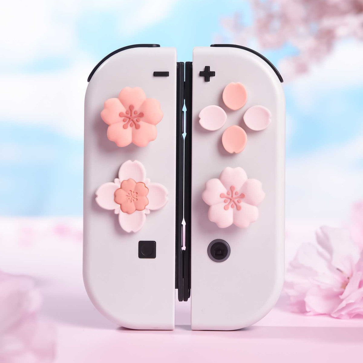Sakura blomster med mini button caps - 4 pak Thumb Grips til Nintendo Switch 2